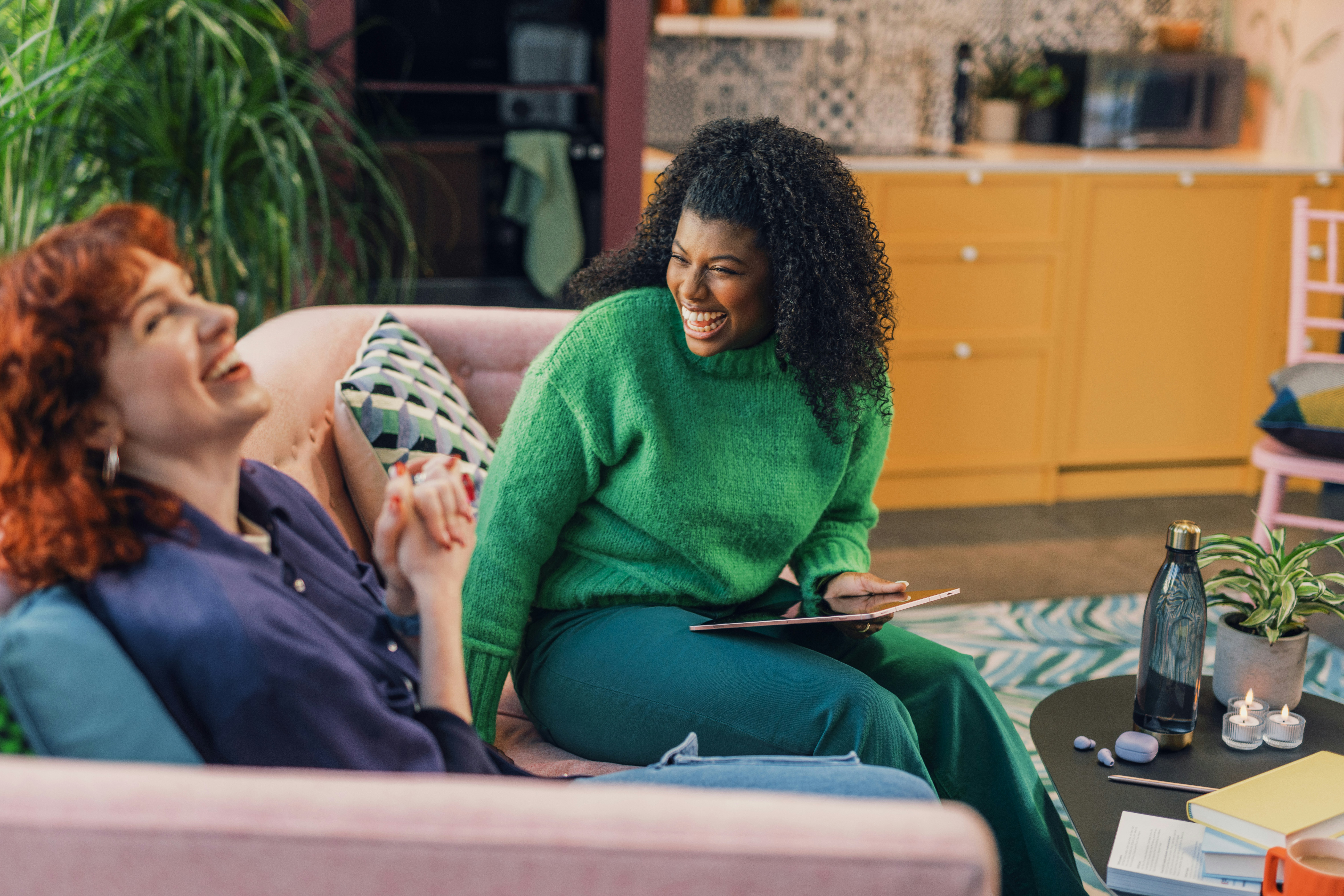 Couple relaxing at home during an online therapy session